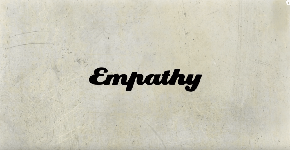 The word empathy written in a black cursive-style font symbolizing empathy vs sympathy